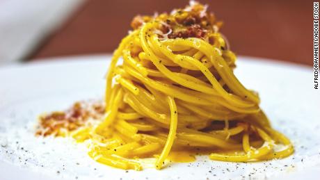 With one egg yolk per pasta serving, spaghetti carbonara makes a comforting meal for one or two.