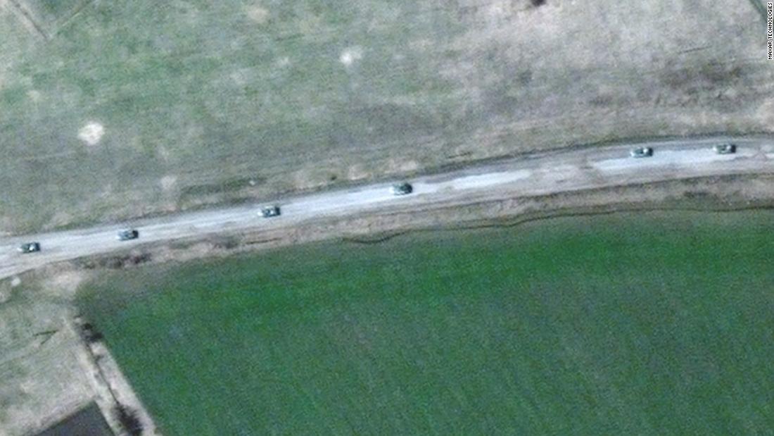 Satellite images show a military convoy in the east, where Ukraine's defense intelligence chief warns of a major assault by Russian troops