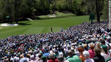 Woods plays his shot from the 12th tee during the final round of the Masters.