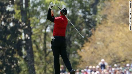 Woods reacts to his shot on the fifth hole during the final round of the Masters.