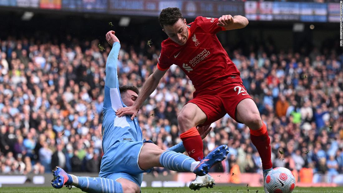 Manchester City and Liverpool play out pulsating draw to keep Premier League title race in the balance
