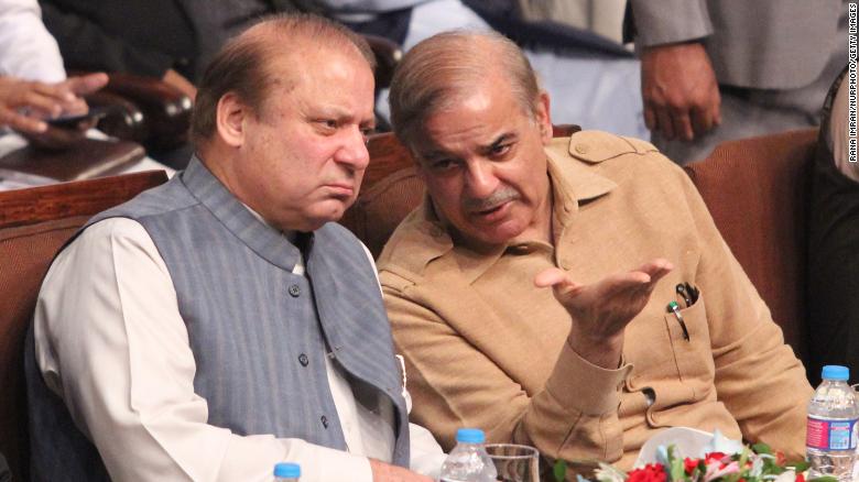 Pakistan&#39;s former prime minister Nawaz Sharif with his younger brother  Shehbaz Sharif in Lahore, Pakistan, in October 2017. 
