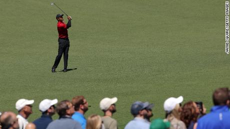 Woods plays his shot on the ninth hole during the final round of the Masters.