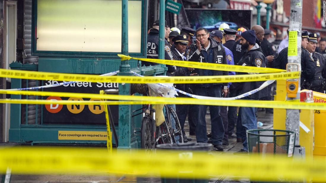 Suspect deployed gas canister and opened fire on Brooklyn subway, shooting 10 people, authorities say