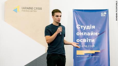 Ilia Filipov, cofounder and CEO of EdEra, an online education platform. The brand banner next to him reads &quot;online education studio, ed-era.com&#39;.&quot;