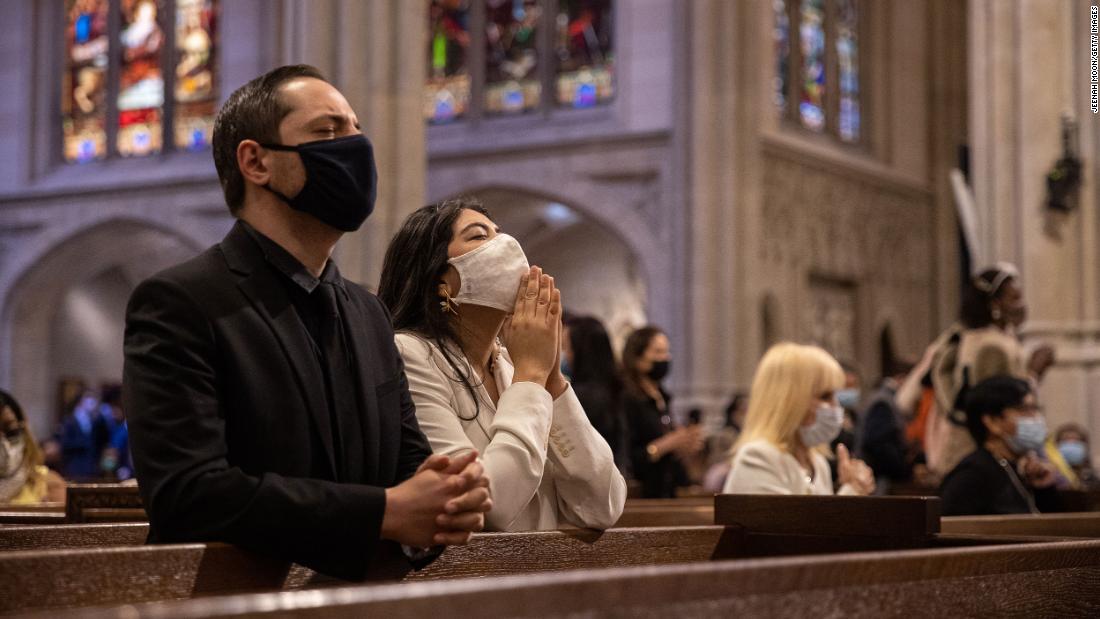 People pray during an Easter mass at Saint Patrick&#39;s Cathedral in New York City on April 4, 2021. Some pastors say they sense more joy among their congregation this year.