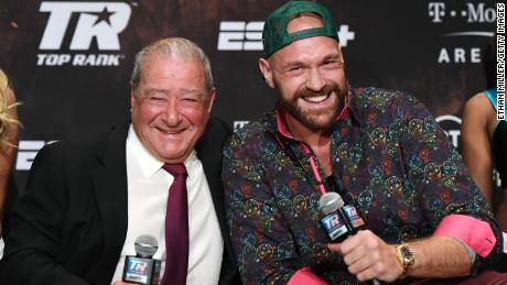 Top Rank founder and CEO Bob Arum (L) and boxer Tyson Fury laugh during a news conference at the MGM Grand Hotel & Casino on September 11, 2019 in Las Vegas.