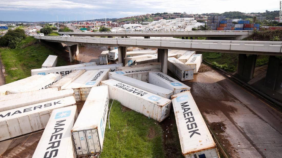 Shipping containers are washed away in Durban on April 12.