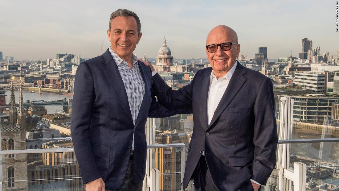 Murdoch poses with Disney CEO Bob Iger in London. In 2017, it was announced that Disney had agreed to purchase most of 21st Century Fox for $52.4 billion.