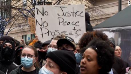 People near police headquarters in Grand Rapids, Michigan protest the death of Patrick Lyoya.
