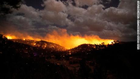 2 dead in New Mexico wildfire that forced evacuations and damaged homes
