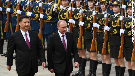Chinese President Xi Jinping and Russian leader Vladimir Putin will undergo a military honor guard outside the Great Hall of the People in Beijing on June 8, 2018. 