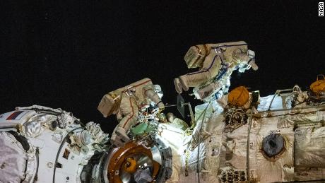 Russian cosmonauts activate space station's new robotic arm