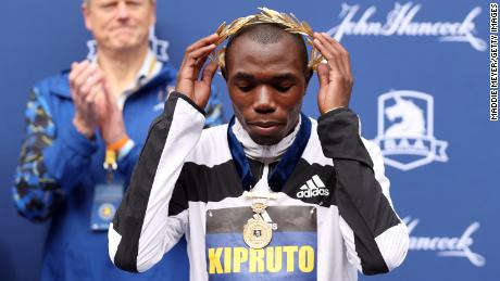 Benson Kipruto of Kenya reacts after winning the 125th Boston Marathon on October 11, 2021. 