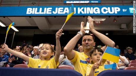 Ukrainian fans cheer during the match between Dayana Yastremska and Alison Riske in the first round of the 2022 Billie Jean King Cup Qualifiers on April 15, 2022 in Asheville, North Carolina. 