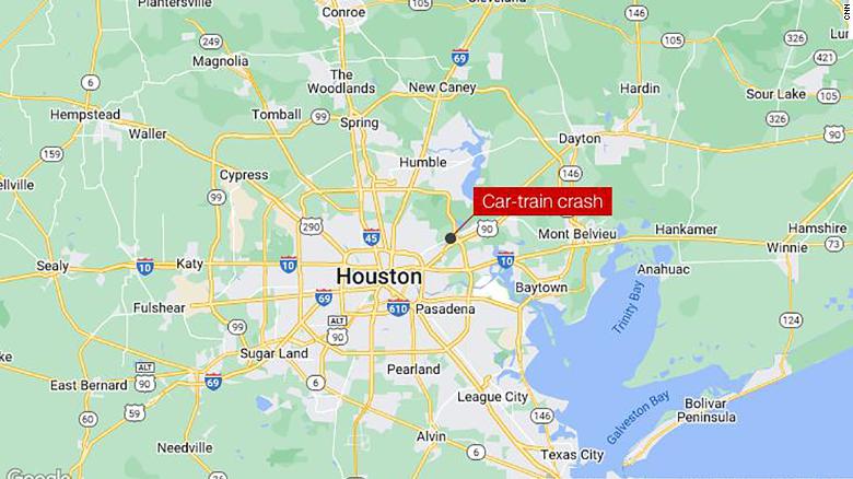 2 killed after a car tried to beat a train at a crossing in Houston