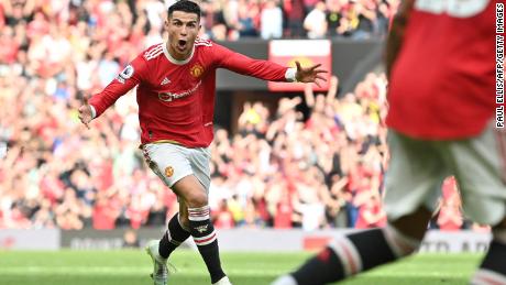 Manchester United&#39;s Portuguese striker Cristiano Ronaldo celebrates after scoring his third goal against Norwich.