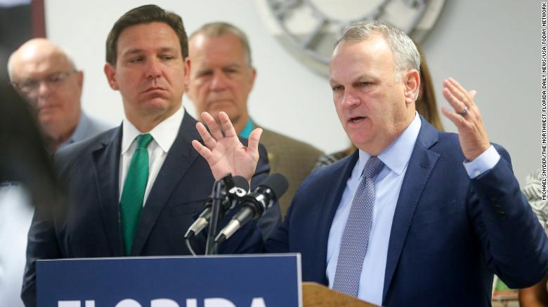 Florida Department of Education Commissioner Richard Corcoran, right, briefly discusses the impact of Bill SB 1048 alongside Florida Governor Ron DeSantis during a morning press conference at Florosa Elementary School on March 17, 2022. 