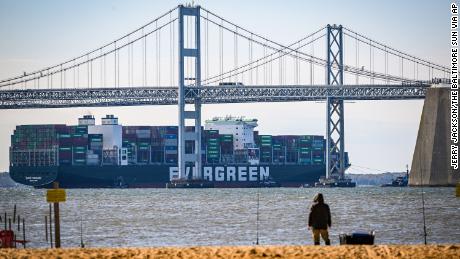Evergreen Marine&#39;s Ever Forward container ship passes under the Chesapeake Bay Bridge after it was freed from mud outside the shipping channel off Pasadena, Md., where is had spent the past month aground.