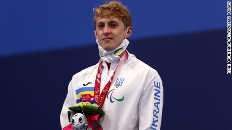 Silver medalist Kyrylo Garashchenko of Team Ukraine poses during the men's 400-meter freestyle - S11 medal ceremony on day 3 of the Tokyo 2020 Paralympic Games.