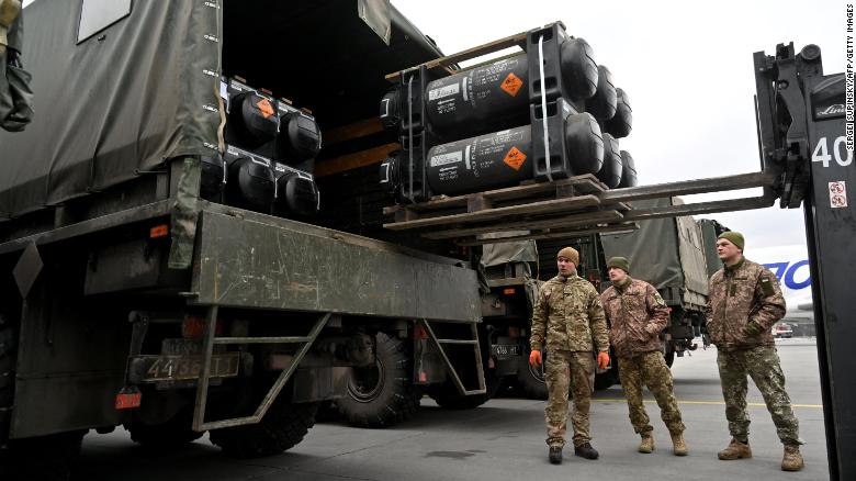 Ukrainian servicemen load a truck with Javelin anti-tank missiles.