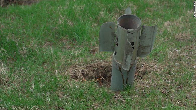 A Smerch rocket tailfin is still in Chernysh's garden.