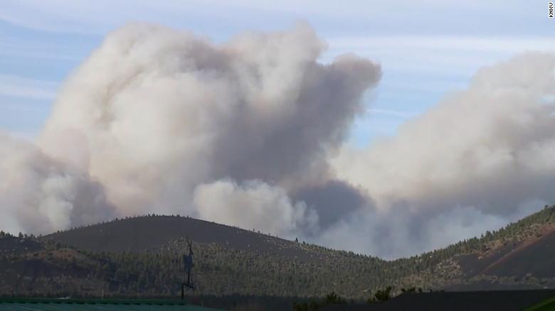 Rapidly moving wildfire in Arizona destroys dozens of structures and forces hundreds to evacuate