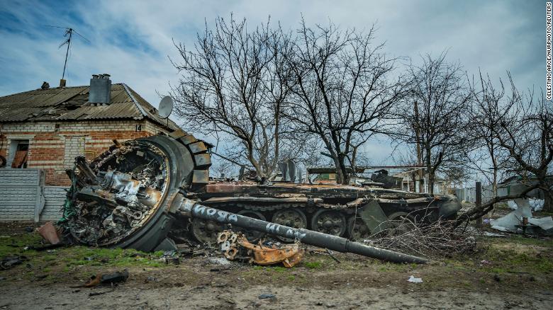 A Russian tank lies destroyed, its turret blown off, after a battle near Kharkiv, Ukraine.