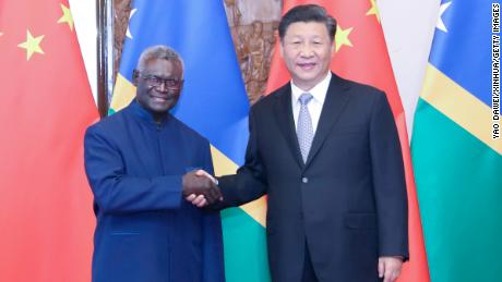 Chinese President Xi Jinping meets with Solomon Islands&#39; Prime Minister Manasseh Sogavare in Beijing on October 9, 2019. 