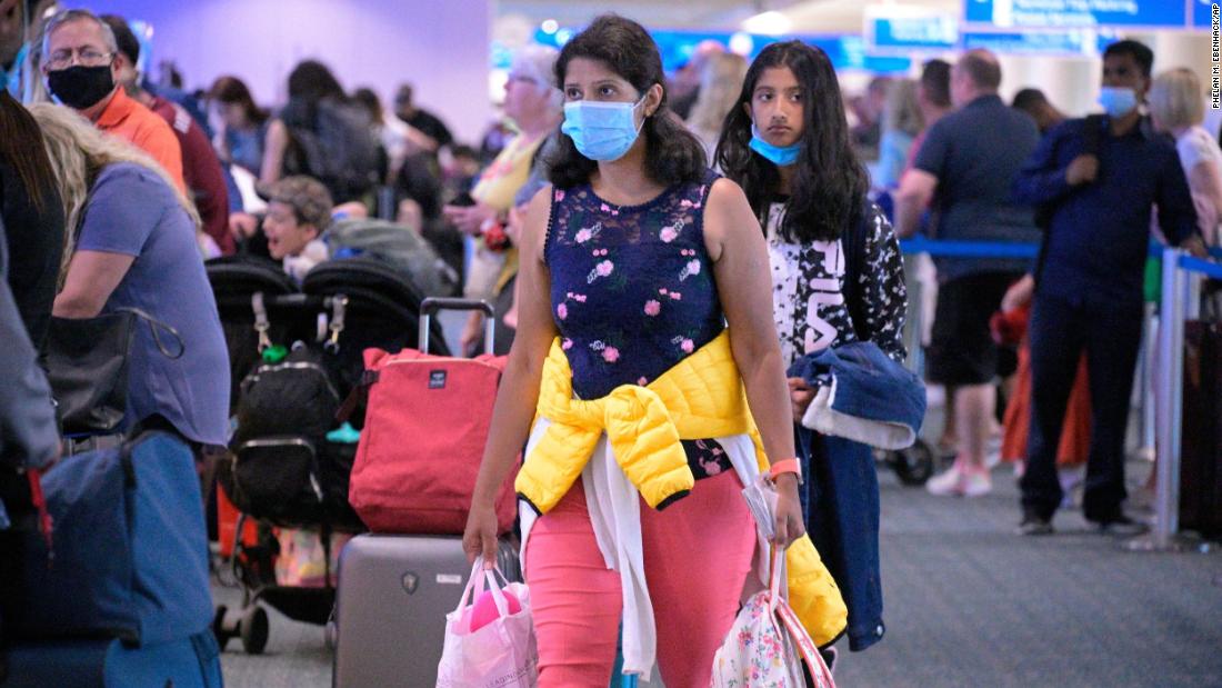 Fighting fewer colds, some travelers will still mask while flying