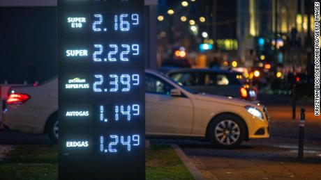 Fuel prices are displayed on a banner at a Total gas station in Berlin, Germany, on Tuesday, March 15, 2022. 