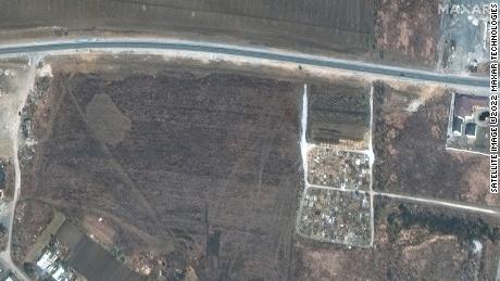 Mass graves near besieged Ukrainian city Mariupol are evidence of war crimes, say Ukrainian officials
