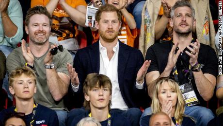Prince Harry watches the weightlifting at the Invictus Games.