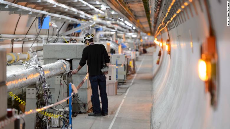 Scientists restart Large Hadron Collider in quest for dark matter