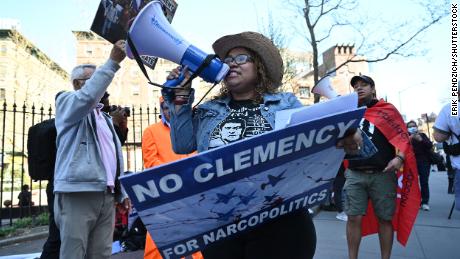 Protesters gather outside the US District Court for the Southern District of New York to call for justice against ex-president Juan Orlando Hernandez of Honduras, on April 22, 2022.