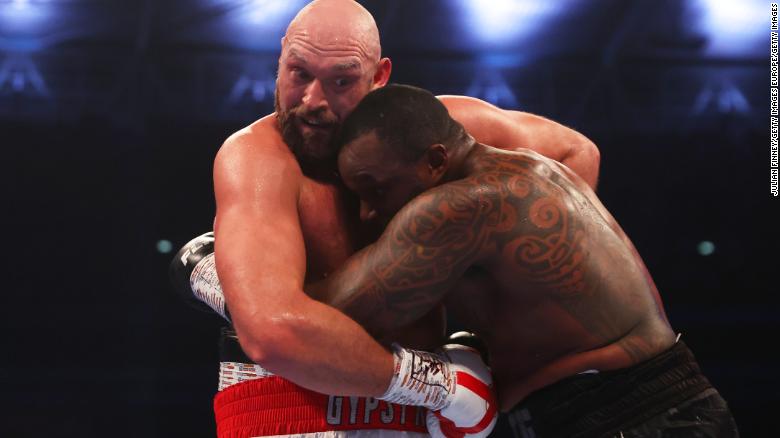 Tyson Fury retains WBC heavyweight title after beating Dillian Whyte by technical knockout in front of 94,000 at Wembley