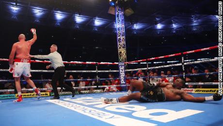 Whyte struggles to get to his feet after Fury landed the final uppercut. 