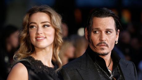 (from left) Amber Heard and Johnny Depp attend ";  Black Mass "  Virgin Atlantic concert screening during the BFI London Film Festival on October 11, 2015.