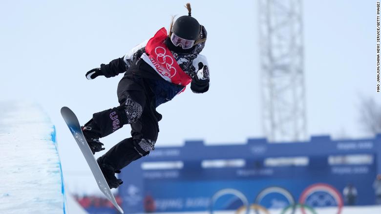 Chloe Kim performing a trick during the Women&#39;s Snowboard Halfpipe Final at the Beijing 2022 Winter Olympics.