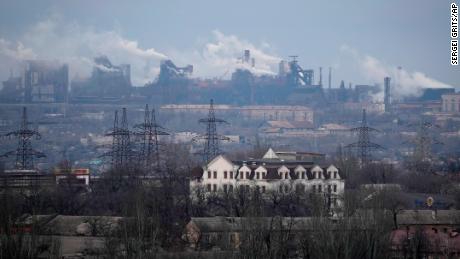 FILE - A metallurgical plant is seen on the outskirts of the city of Mariupol, Ukraine, Thursday, Feb. 24, 2022. Russia began evacuating its embassy in Kyiv, and Ukraine urged its citizens to leave Russia. Russian President Vladimir Putin ordered his forces not to storm the last remaining Ukrainian stronghold in the besieged city of Mariupol but to block it &quot;so that not even a fly comes through.&quot; Defense Minister Sergei Shoigu told Putin on Thursday that the sprawling Azovstal steel plant where Ukrainian forces were holed up was &quot;securely blocked.&quot; (AP Photo/Sergei Grits, File)