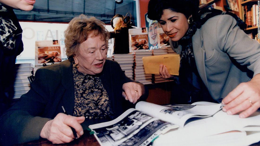 Child talks with fans at a book signing in Toronto in 1991. 