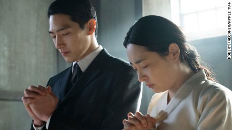In "Pachinko"  Sunja (Minha Kim) and her husband Isak (Steve Sanghyun Noh) leave Korea for a new life in Japan. 