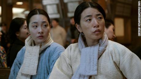 Sunja (Minha Kim) and her mother (Inji Jeong) struggle with the rigors of life in Japanese-occupied Korea.