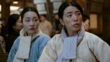 Sunja (Minha Kim) and her mother (Inji Jeong) navigate the hardships of life in Japanese-occupied Korea.
