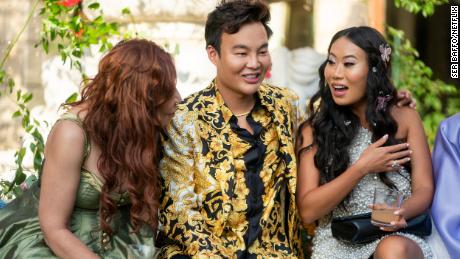 (From left) Anna Shay, Kane Lim and Kelly Mi Li are shown in a scene from the second season of &quot;Bling Empire.&quot;