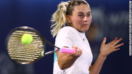 Kostyuk plays a shot in a match against Aryna Sabalenka of Belarus during the second day of the Dubai Duty Free Tennis Championships on February 15, 2022.