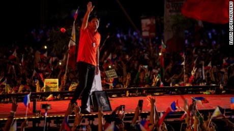 Ferdinand &quot;Bongbong&quot; Marcos Jr., the son and namesake of the late Philippine dictator, gestures to the crowd after delivering a speech in a campaign rally in San Fernando, Pampanga province, Philippines, April 29, 2022. REUTERS/Eloisa Lopez/File Photo