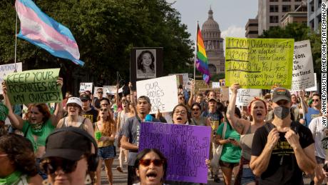 Protesters march from the Capitol to the United States Federal Courthouse to rally for abortion rights in Austin, Texas, in response to the news that the U.S. Supreme Court could be poised to overturn Roe v. Wade.