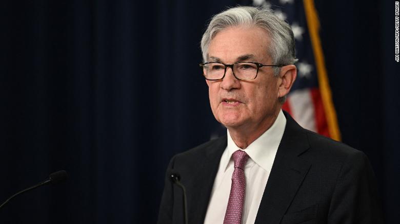 Fed raises interest rates as it tries to catch up with inflation 