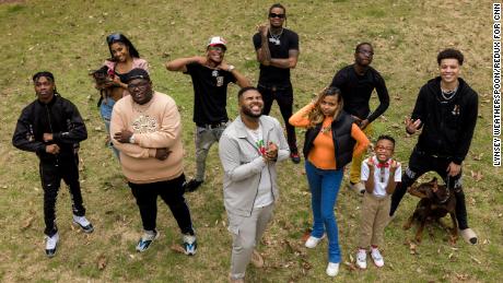 The Collab Crib members pose for a photo in their backyard.